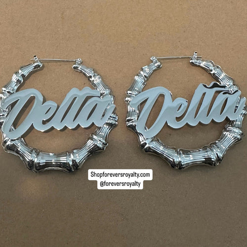 Silver Delta hoop earrings.