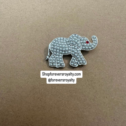 Pearl elephant pin.