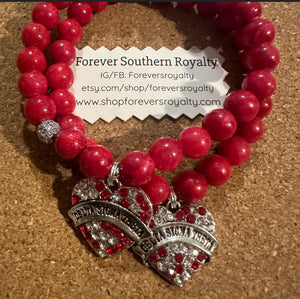 Red Delta heart bracelet.