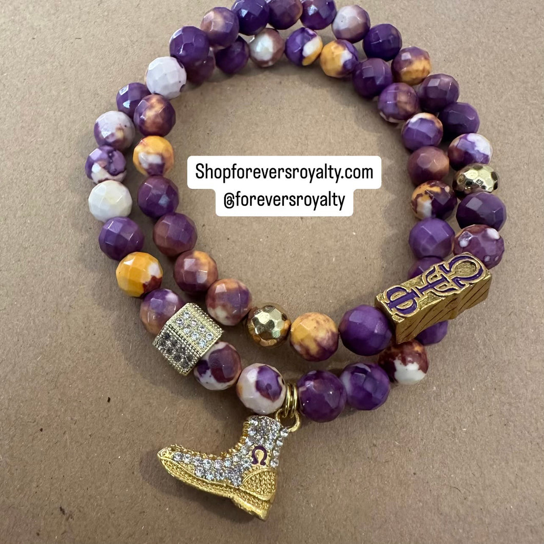 2 Omega Psi Phi bracelets.