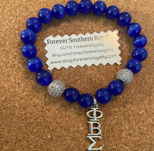 Blue PBS bracelet.