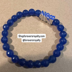 Silver and Blue Zeta bracelet.