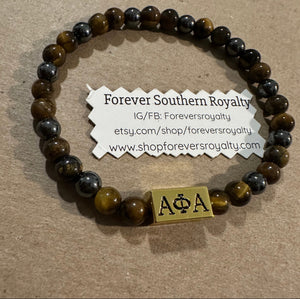 1906 Alpha bracelet.