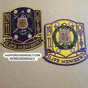 Omega life member patch.