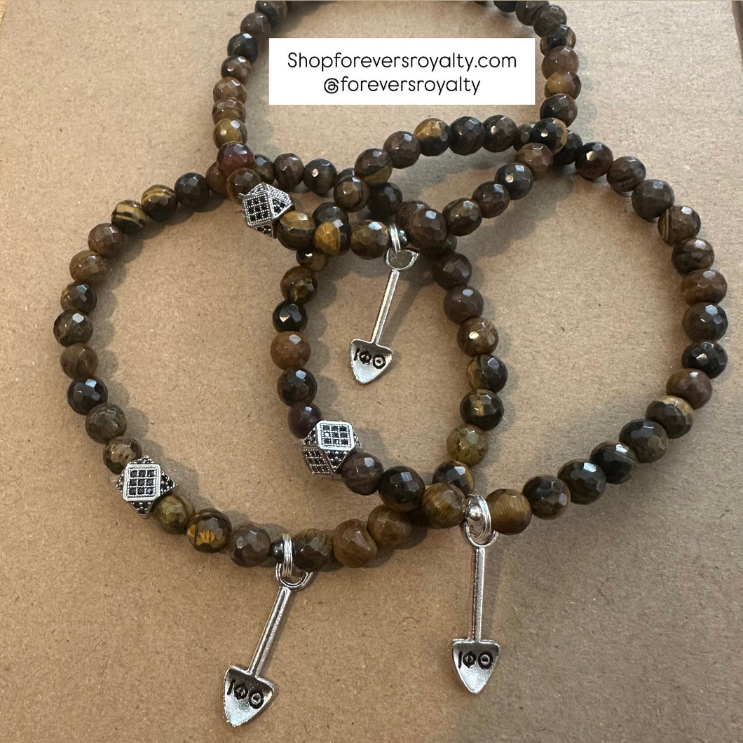 The Iota Phi Theta shovel bracelet