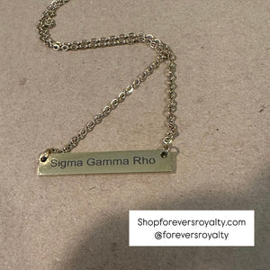 Sigma Gamma Rho necklace.