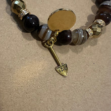 Load image into Gallery viewer, Brown and gold Iota Phi Theta bracelet .