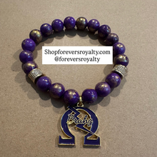 Load image into Gallery viewer, Purple and gold BRUHZ bracelet (Omega Psi Phi)
