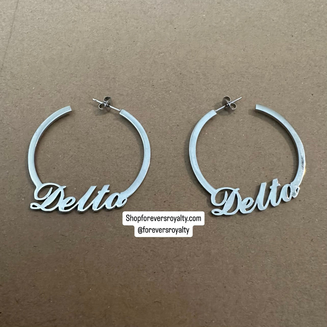 Silver Delta earrings.