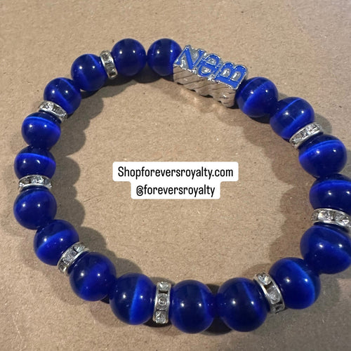 The blue Zeta Phi Beta bracelet.