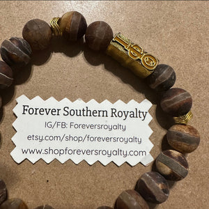 Brown gemstone Iota Phi Theta bracelet .