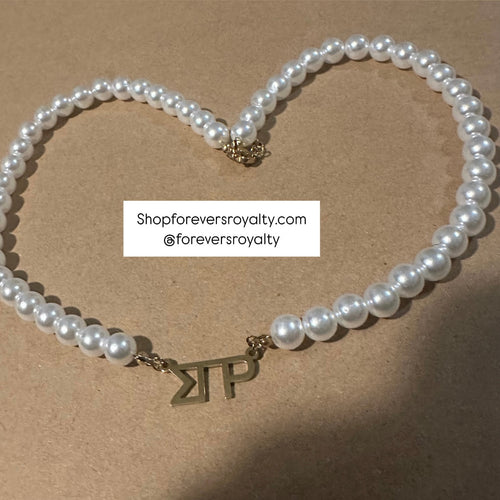 Sigma Gamma Rho pearl necklace.