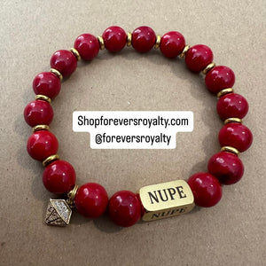 Red and gold NUPE bracelet.