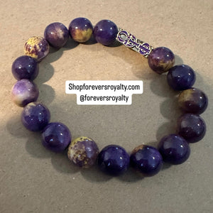 Purple Omega Psi Phi bracelet.