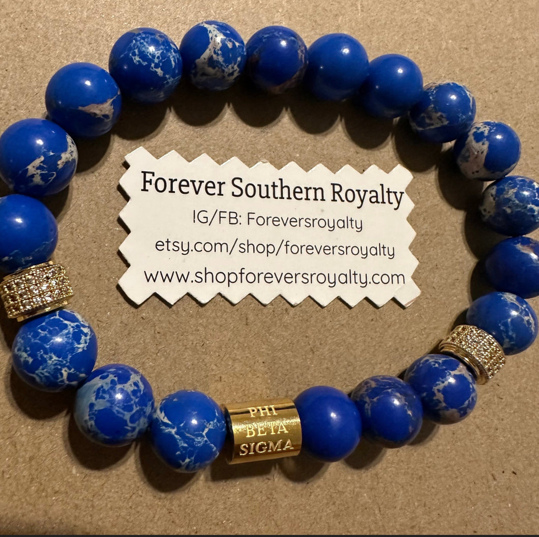 Gold Phi Beta Sigma bracelet.