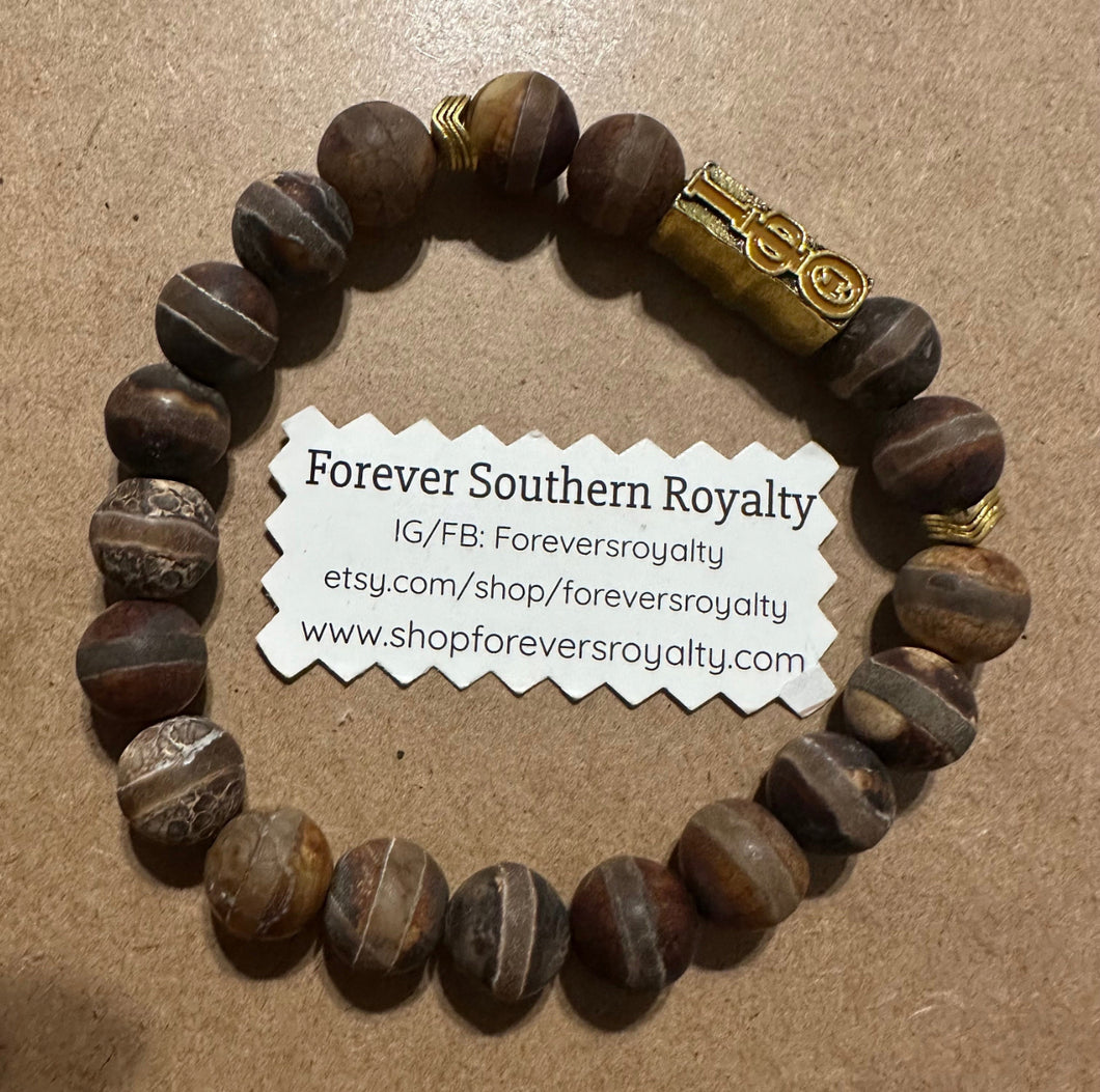 Brown gemstone Iota Phi Theta bracelet .