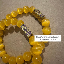 Load image into Gallery viewer, All yellow Omega Psi Phi bracelet.