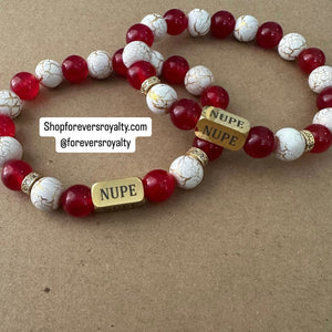 The gold Nupe bracelet.