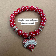 Load image into Gallery viewer, The red polka dot Delta bracelet.