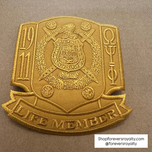 All gold Omega Psi Phi life member patch