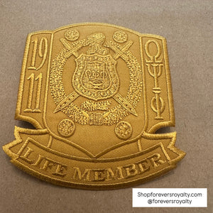 All gold Omega Psi Phi life member patch