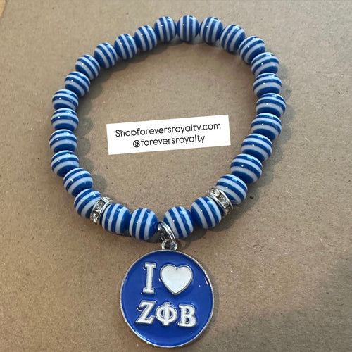 Blue and white Zeta Phi Beta bracelet.