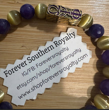 Load image into Gallery viewer, The purple and yellow Omega Psi Phi bracelet.