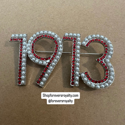 1913 Delta Sigma Theta pin.