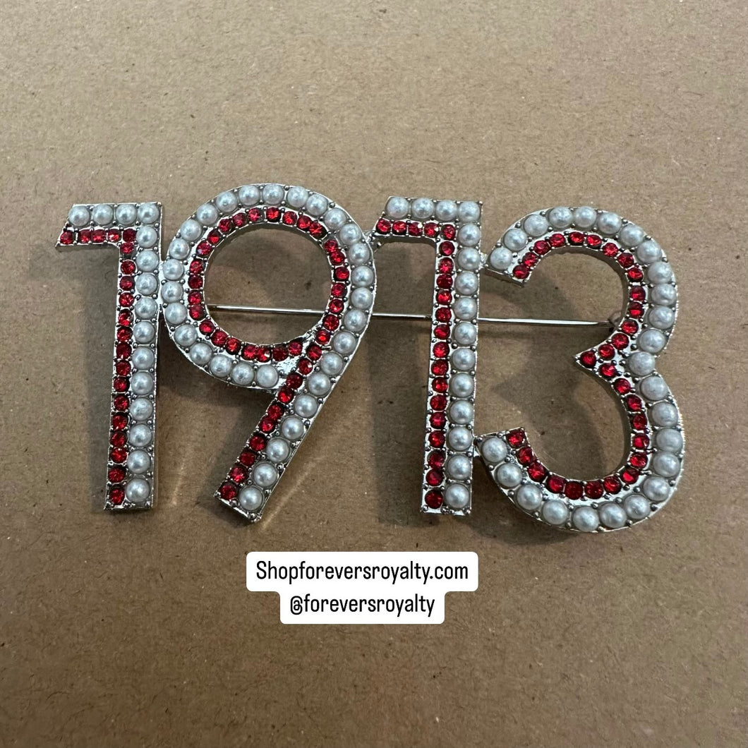 1913 Delta Sigma Theta pin.