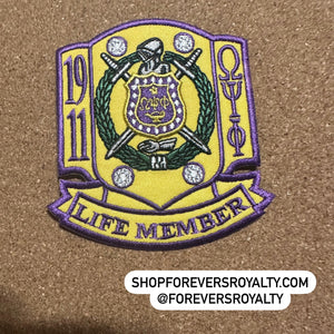 Omega life member patch.