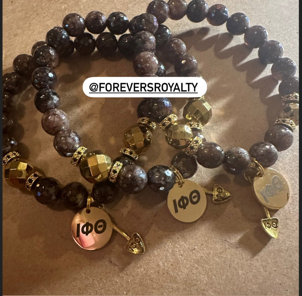 The Iota Phi Theta shovel bracelet.