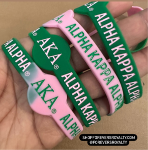 Pink and green Alpha Kappa Alpha wristband