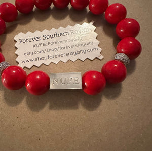 Silver NUPE bracelet.