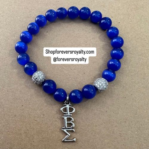 Blue PBS bracelet.