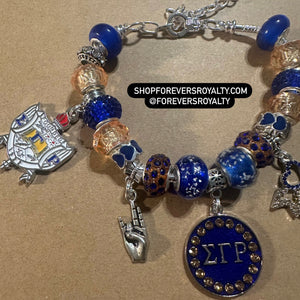 Silver Sigma Gamma Rho charm bracelet.