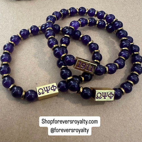 Purple Omega Psi Phi bracelet with gold.