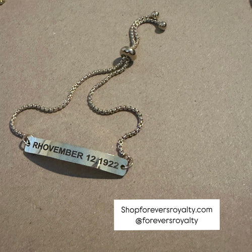 The gold Sigma bracelet.