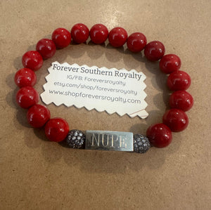 The Red NUPE bracelet.