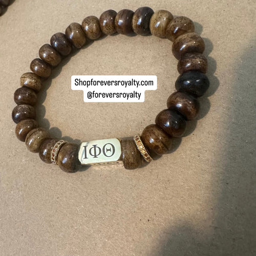 Iota Phi Theta wooden bracelet.