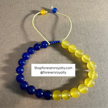Load image into Gallery viewer, Yellow and blue bracelet.