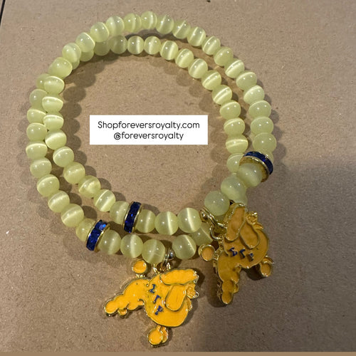 The yellow poodle bracelet.