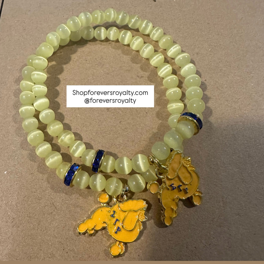 The yellow poodle bracelet.