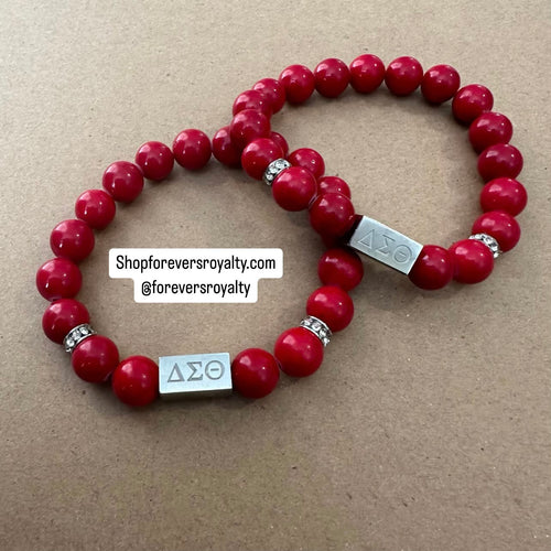 Red Delta bar bracelet.