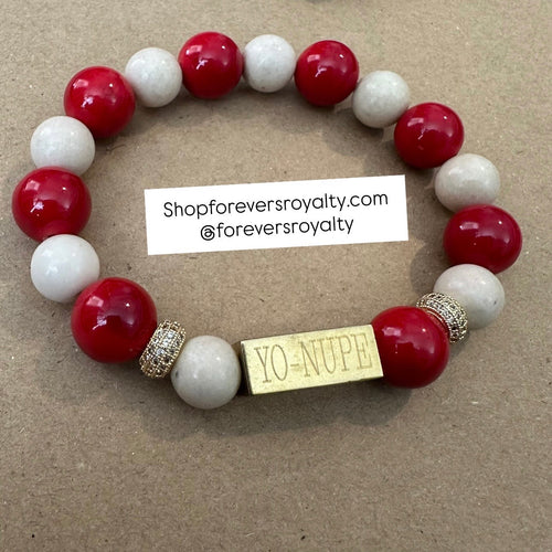 The gold YO Nupe bracelet.