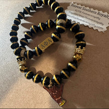 Load image into Gallery viewer, Black and gold Alpha bracelet set.