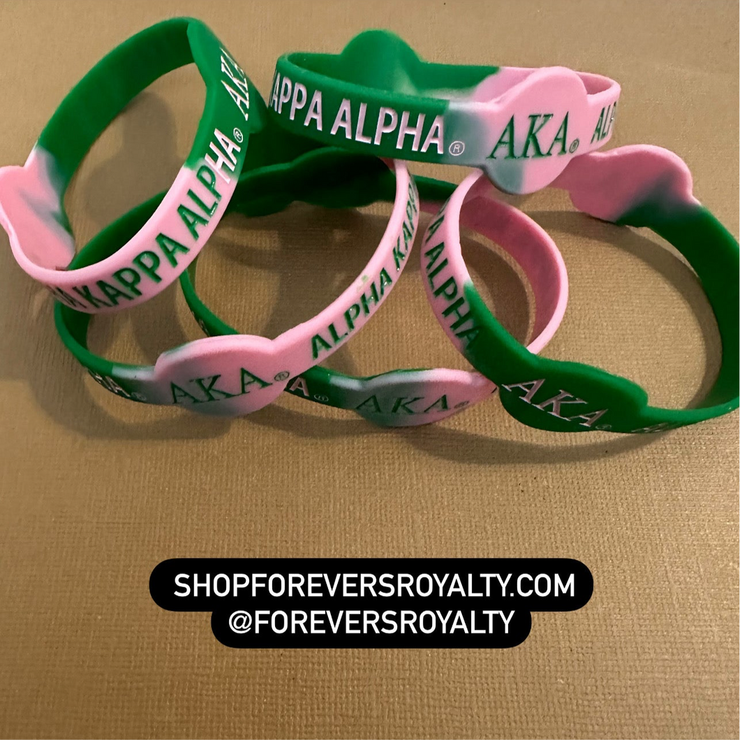 Pink and green Alpha Kappa Alpha wristband