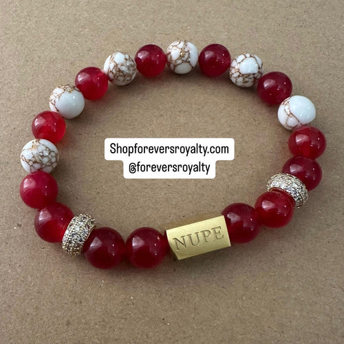 The gold Nupe bracelet.