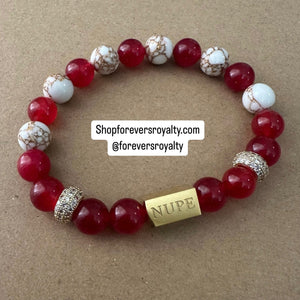 The gold Nupe bracelet.