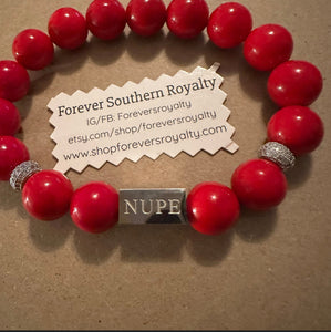 Silver NUPE bracelet.