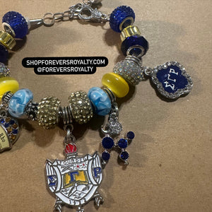 Silver Sigma Gamma Rho charm bracelet.